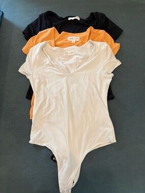 Olive & Oak White, Orange and Black V-Neck Bodysuits - Trio